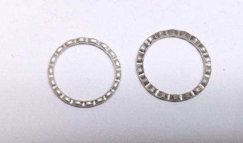 Judy Larson's Mike's Surpirise Claire's Ripple Pendant - , Contemporary Wire Jewelry, Jump Rings, Jump Ring, Making Jump Rings, Butane Torch, Soldering, Solder, Place a ring back in the ring press and hammer again.